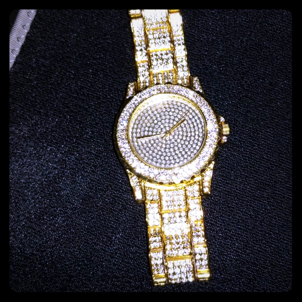 Women's gold plated watch with clear jewels